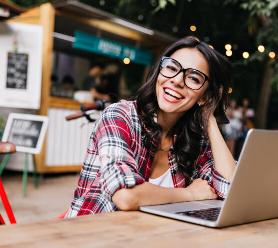 debonair-white-girl-casual-shirt-posing-street-with-computer-outdoor-portrait-enthusiastic-female-student-using-laptop